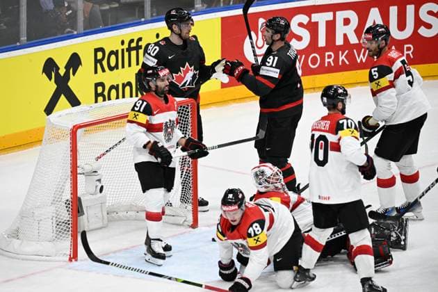 Pierre-Luc Dubois (CAN; 80) receives congratulations on a goal from teammate John Tavares (CAN; 91) during the 2024 IIHF World Championship, WM, Weltmeisterschaft group A, match Canada vs Austria, in Prague, Czech Republic, on May 14, 2024. (CTKxPhoto MichalxKamaryt) CTKPhotoP2024051409842  CTKPhotoP2024051409842