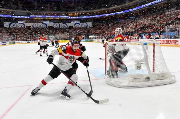 PRAGUE, CZECH REPUBLIC - MAY 14: Bernd Wolf of Austria in a battle with Dylan Cozens of Canada during the preliminary round match between Canada and Austria at Prague Arena on May 14, 2024 in Prague, Czech Republic. Prague Czech Republic Copyright: xJustPictures.ch AndreaxBrancax jp-en-EuSpIm-AB_14052024_DSC_0527