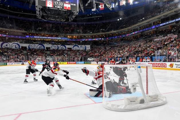 PRAGUE, CZECH REPUBLIC - MAY 14: goalkeeper David Madlener of Austria makes a save against Dylan Cozens of Canada during the preliminary round match between Canada and Austria at Prague Arena on May 14, 2024 in Prague, Czech Republic. Prague Czech Republic Copyright: xJustPictures.ch AndreaxBrancax jp-en-EuSpIm-AB_14052024_DSC_0427
