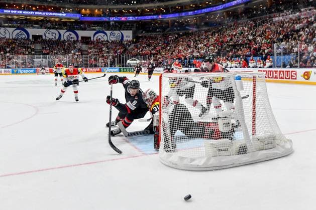 PRAGUE, CZECH REPUBLIC - MAY 14: Michael Bunting of Canada in action against goalkeeper David Madlener of Austria during the preliminary round match between Canada and Austria at Prague Arena on May 14, 2024 in Prague, Czech Republic. Prague Czech Republic Copyright: xJustPictures.ch AndreaxBrancax jp-en-EuSpIm-AB_14052024_DSC_0576