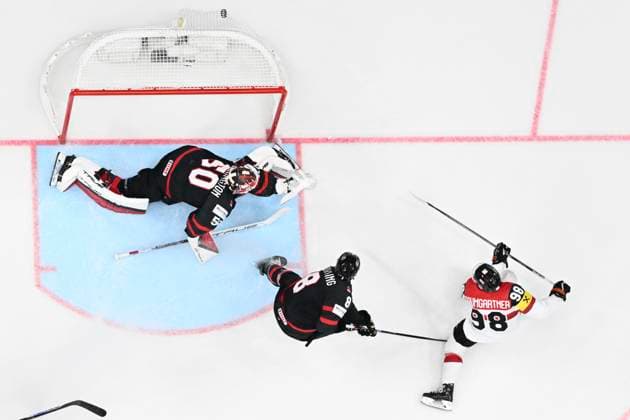 L-R goalkeeper Jordan Binnington (CAN), Michael Bunting (CAN) and scoring Benjamin Baumgartner (AUT) in action during the 2024 IIHF World Championship, WM, Weltmeisterschaft group A, match Canada vs Austria, in Prague, Czech Republic, on May 14, 2024. (CTKxPhoto MichalxKamaryt) CTKPhotoP2024051410575  CTKPhotoP2024051410575