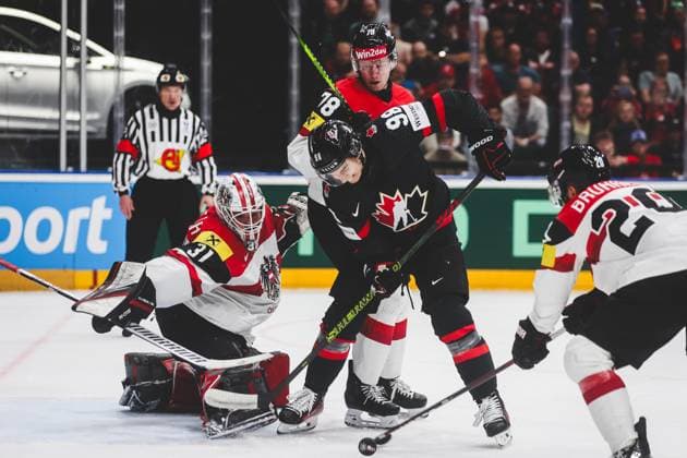 Ice hockey, Eishockey - IIHF WC 2024 PRAGUE,CZECH REPUBLIC,14.MAY.24 - ICE HOCKEY - IIHF Ice Hockey World Championship, WM, Weltmeisterschaft 2024, group stage, Austria vs Canada. Image shows David Madlener, Thimo Nickl (AUT) and Connor Bedard (CAN).  GEPAxpictures xDanielxGoetzhaber