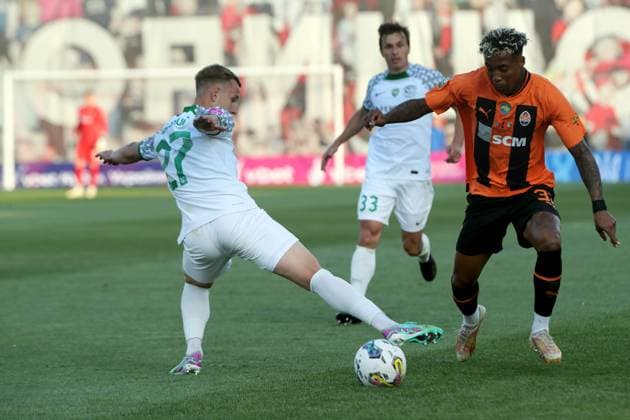 RIVNE, UKRAINE - MAY 15, 2024 - Defender Illia Krupskyi (L) of FC Vorskla Poltava and midfielder Kevin of FC Shakhtar Donetsk are seen in action during the 2023 24 Ukrainian Cup final match at the Avanhard Stadium, Rivne, western Ukraine. The Orange-and-Blacks claimed a 2-1 win over their rivals from Poltava and took home the Ukrainian Cup for the 14th time. On May 11, the Miners won the 2023 24 Ukrainian Premier League title early by beating FC Dynamo Kyiv 1-0 in Lviv. Thus, the Donetsk team achieved a golden double for the 2023 24 season and became the most decorated club since Ukraine’s independence with 39 trophies. Rivne Copyright: Pavlo_Bagmut Shakhtar Donetsk win Ukrainian Cup for 14th time