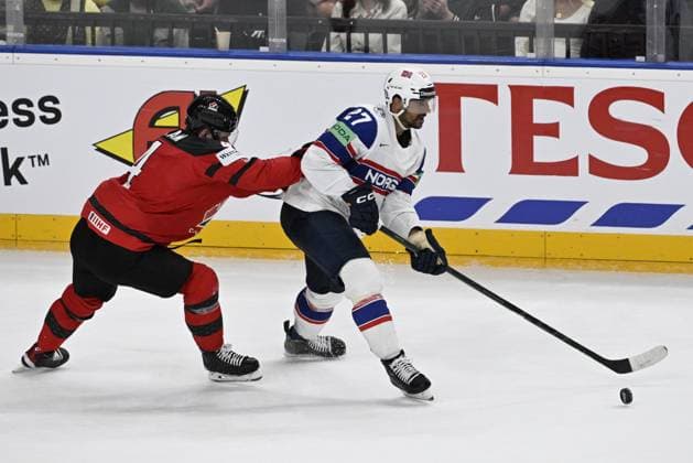 Canada vs. Norway group A match of the 2024 IIHF World Championship, WM, Weltmeisterschaft in Prague, Czech Republic, on May 16, 2024. From left Bowen Byram of Canada and Andreas Martinsen of Norway. (CTKxPhoto KaterinaxSulova) CTKPhotoP2024051610385  CTKPhotoP2024051610385