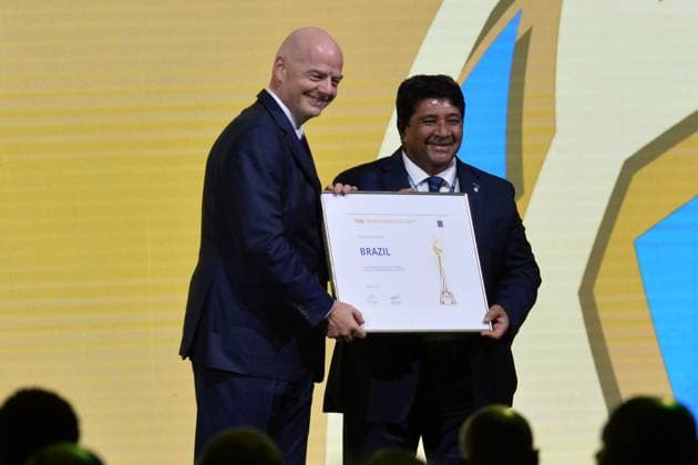 Sport Themen der Woche KW21 (240517) -- BANGKOK, May 17, 2024 -- Brazilian Football Confederation (CBF) president Ednaldo Rodrigues (R) receives a certification from FIFA President Gianni Infantino after Brazil being announced as the host of the 2027 FIFA Women s World Cup during the 74th FIFA Congress in Bangkok, Thailand, May 17, 2024. ) (SP)THAILAND-BANGKOK-FIFA-CONGRESS RachenxSageamsak 