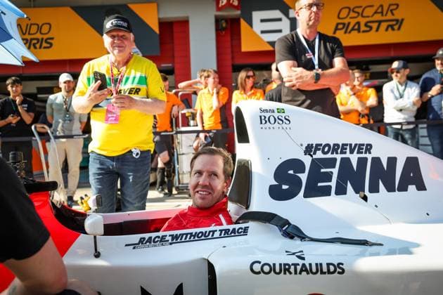 VETTEL Sebastian, driving the Mclaren MP4 8 in tribute to Ayrton Senna, in front of his father Norbert during the Formula 1 MSC Cruises Gran Premio del Made in Italy e Dell™Emilia-Romagne 2024, 7th round of the 2024 Formula One World Championship, WM, Weltmeisterschaft from May 17 to 19, 2024 on the Autodromo Enzo e Dino Ferrari, in Imola, Italy - F1 - EMILIA-ROMAGNA GRAND PRIX 2024 DPPI Panoramic  240518_R07_EMR_DP_FGOO5334