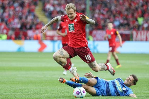 19.05.2024, xusrbx, Fussball 2.Bundesliga, 1.FC Kaiserslautern - Eintracht Braunschweig emspor, v.l. Tymoteusz Puchacz (1. FC Kaiserslautern, 15), Jan Hendrik Marx (Eintracht Braunschweig, 26), (DFL DFB REGULATIONS PROHIBIT ANY USE OF PHOTOGRAPHS as IMAGE SEQUENCES and or QUASI-VIDEO) Kaiserslautern