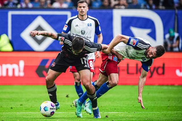 Jens Castrop (1. FC Nuernberg, 17), Jonas Meffert (Hamburger SV, 23) GER, Hamburger SV vs. 1. FC Nuernberg, Fussball, 2. Bundesliga, Spieltag 34, Saison 2023 2024, 19.05.2024 DFL REGULATIONS PROHIBIT ANY USE OF PHOTOGRAPHS AS IMAGE SEQUENCES AND OR QUASI-VIDEO GER, Hamburger SV vs. 1. FC Nuernberg, Fussball, 2. Bundesliga, Spieltag 34, Saison 2023 2024, 19.05.2024 Hamburg
