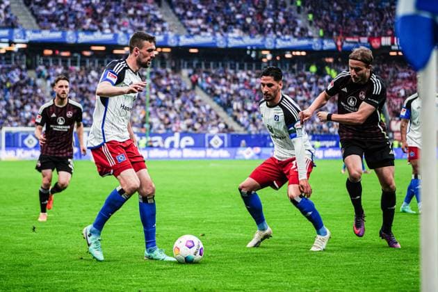 Jonas Meffert (Hamburger SV, 23), Ludovit Reis (Hamburger SV, 14), Felix Lohkemper (1. FC Nuernberg, 07) GER, Hamburger SV vs. 1. FC Nuernberg, Fussball, 2. Bundesliga, Spieltag 34, Saison 2023 2024, 19.05.2024 DFL REGULATIONS PROHIBIT ANY USE OF PHOTOGRAPHS AS IMAGE SEQUENCES AND OR QUASI-VIDEO GER, Hamburger SV vs. 1. FC Nuernberg, Fussball, 2. Bundesliga, Spieltag 34, Saison 2023 2024, 19.05.2024 Hamburg