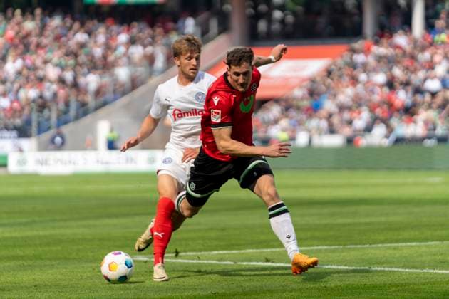 Jann-Fiete Arp (Holstein Kiel, 20), Phil Neumann (Hannover 96, 05) GER, Hannover 96 vs. Holstein Kiel, Fußball, 2. Bundesliga, 34. Spieltag, Spielzeit 2023 2024, 19.05.2024 DFL REGULATIONS PROHIBIT ANY USE OF PHOTOGRAPHS AS IMAGE SEQUENCES AND OR QUASI-VIDEO Hannover 96 vs. Holstein Kiel, Fußball, 2. Bundesliga, 34. Spieltag, Spielzeit 2023 2024, 19.05.2024 Hannover