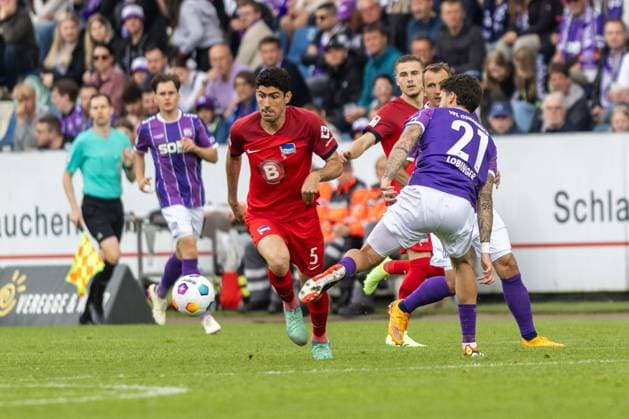 VfL Osnabrück vs. Hertha BSC; Osnabrück, 19.05.2024 Andreas Bouchalakis (Hertha BSC Berlin, 5) und Lex Tyger Lobinger (VfL Osnabrück, 21) 2. Fußball Bundesliga 34. Spieltag: VfL Osnabrück vs. Hertha BSC, Stadion Bremer Brücke am 19.05.2024. DFB DFL REGULATIONS PROHIBIT ANY USE OF PHOTOGRAPHS AS IMAGE SEQUENCES AND OR QUASI-VIDEO.