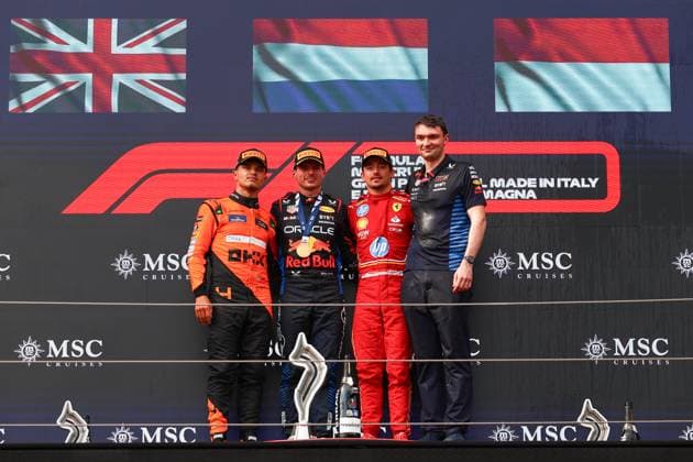 Race winner Max Verstappen of the Netherlands and Oracle Red Bull Racing, Second placed Lando Norris of Great Britain and McLaren, Third placed Charles Leclerc of Monaco and Ferrari and David Morgan, Aero Trackside Performance Team Leader at Oracle Red Bull Racing gestikuliert, Gestik, Race, F1 Emilia-Romagna Grand Prix 2024, Autodromo Enzo e Dino Ferrari am 19. May 2024 in Imola, Italy. (Foto von Diogo Cardoso DeFodi Images) Race winner Max Verstappen of the Netherlands and Oracle Red Bull Racing, Second placed Lando Norris of Great Britain and McLaren, Third placed Charles Leclerc of Monaco and Ferrari and David Morgan, Aero Trackside Performance Team Leader at Oracle Red Bull Racing celebrate on the podium, Race, F1 Emilia-Romagna Grand Prix 2024, Autodromo Enzo e Dino Ferrari on May 19, 2024 in Imola, Italy. (Photo by Diogo Cardoso DeFodi Images) Defodi-645_f1imo20240518_0405