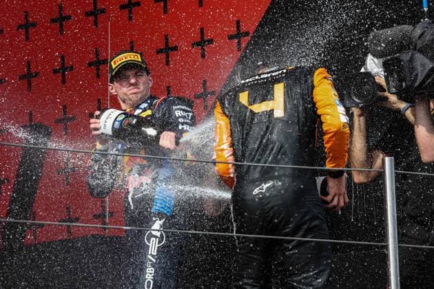 VERSTAPPEN Max (ned), Red Bull Racing RB20, portrait NORRIS Lando (gbr), McLaren F1 Team MCL38, portrait podium during the Formula 1 MSC Cruises Gran Premio del Made in Italy e Dell™Emilia-Romagne 2024, 7th round of the 2024 Formula One World Championship, WM, Weltmeisterschaft from May 17 to 19, 2024 on the Autodromo Enzo e Dino Ferrari, in Imola, Italy - F1 - EMILIA-ROMAGNA GRAND PRIX 2024 DPPI Panoramic 240519_R07_EMR_DP_XB3_2852