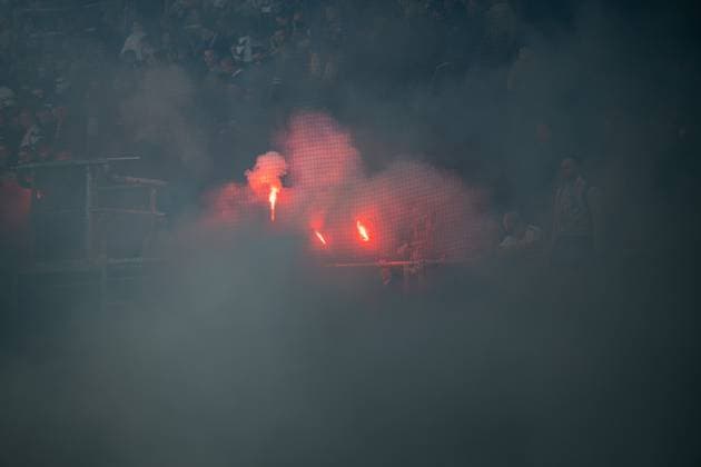 Rostock, Deutschland 19. Mai 2024: 2. BL - 2023 2024 - FC Hansa Rostock vs. SC Paderborn Im Bild: Pyro und schwarzer Rauch auf der Südtribüne DFL regulations prohibit any use of photographs as image sequences and or quasi-video.