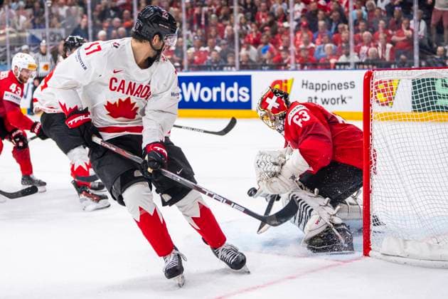 PRAGUE, CZECH REPUBLIC - MAY 19: goalkeeper Leonardo Genoni of Switzerland saves on Jack Mcbain of Canada during the preliminary round match between Switzerland and Canada at Prague Arena on May 19, 2024 in Prague, Czech Republic. Prague Prague Arena Czech Republic Copyright: xJustPictures.ch JarixPestelaccix jp-en-EuSpIm-JP4_JAR_Switzerland_Canada_19May2024_164