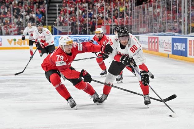 PRAGUE, CZECH REPUBLIC - MAY 19: Pierre-Luc Dubois of Canada defends the puck from Calvin Thurkauf of Switzerland during the preliminary round match between Switzerland and Canada at Prague Arena on May 19, 2024 in Prague, Czech Republic. Prague Prague Arena Czech Republic Copyright: xJustPictures.ch AndreaxBrancax jp-en-EuSpIm-AB_19052024_AAB_7979