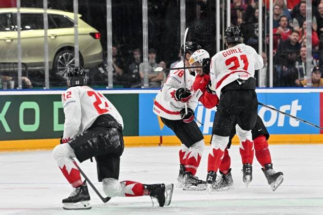 PRAGUE, CZECH REPUBLIC - MAY 19: Kevin Fiala of Switzerland gets hit by Kaiden Guhle of Canada during the preliminary round match between Switzerland and Canada at Prague Arena on May 19, 2024 in Prague, Czech Republic. Prague Prague Arena Czech Republic Copyright: xJustPictures.ch AndreaxBrancax jp-en-EuSpIm-AB_19052024_AAB_8257