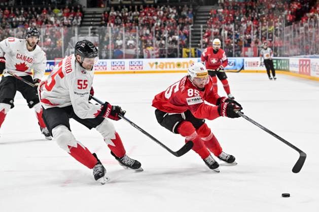 PRAGUE, CZECH REPUBLIC - MAY 19: Sven Andrighetto of Switzerland fights for the puck against Colton Parayko during the preliminary round match between Switzerland and Canada at Prague Arena on May 19, 2024 in Prague, Czech Republic. Prague Prague Arena Czech Republic Copyright: xJustPictures.ch AndreaxBrancax jp-en-EuSpIm-AB_19052024_AAB_9334