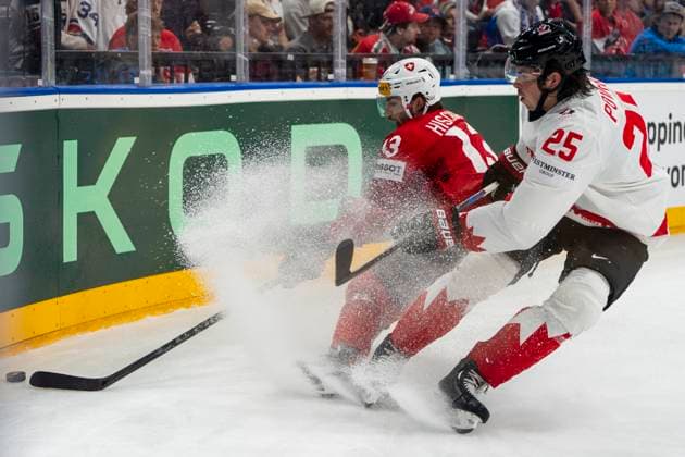 PRAGUE, CZECH REPUBLIC - MAY 19: Nico Hischier of Switzerland (L) against Owen Power of Canada (R) during the preliminary round match between Switzerland and Canada at Prague Arena on May 19, 2024 in Prague, Czech Republic. Prague Prague Arena Czech Republic Copyright: xJustPictures.ch JarixPestelaccix jp-en-EuSpIm-JP4_JAR_Switzerland_Canada_19May2024_234
