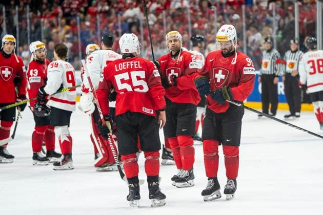 PRAGUE, CZECH REPUBLIC - MAY 19: Roman Josi of Switzerland (R), Nino Niederreiter of Switzerland (C), Romain Loeffel of Switzerland (L) disappointed after the preliminary round match between Switzerland and Canada at Prague Arena on May 19, 2024 in Prague, Czech Republic. Prague Prague Arena Czech Republic Copyright: xJustPictures.ch JarixPestelaccix jp-en-EuSpIm-JP4_JAR_Switzerland_Canada_19May2024_320