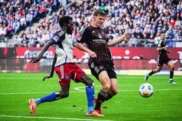 Bakery Jatta (Hamburger SV, 18), Finn Jeltsch (1. FC Nuernberg, 44) GER, Hamburger SV vs. 1. FC Nuernberg, Fussball, 2. Bundesliga, Spieltag 34, Saison 2023 2024, 19.05.2024 DFL REGULATIONS PROHIBIT ANY USE OF PHOTOGRAPHS AS IMAGE SEQUENCES AND OR QUASI-VIDEO GER, Hamburger SV vs. 1. FC Nuernberg, Fussball, 2. Bundesliga, Spieltag 34, Saison 2023 2024, 19.05.2024 Hamburg