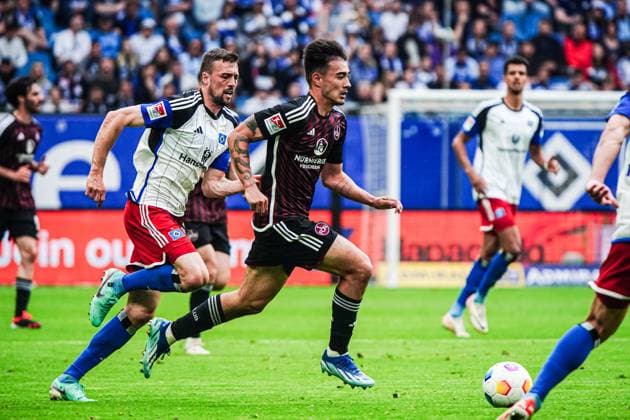 Jens Castrop (1. FC Nuernberg, 17), Jonas Meffert (Hamburger SV, 23) GER, Hamburger SV vs. 1. FC Nuernberg, Fussball, 2. Bundesliga, Spieltag 34, Saison 2023 2024, 19.05.2024 DFL REGULATIONS PROHIBIT ANY USE OF PHOTOGRAPHS AS IMAGE SEQUENCES AND OR QUASI-VIDEO GER, Hamburger SV vs. 1. FC Nuernberg, Fussball, 2. Bundesliga, Spieltag 34, Saison 2023 2024, 19.05.2024 Hamburg