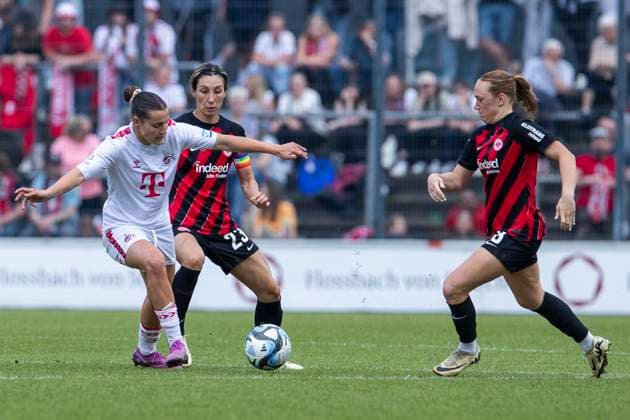 GOOGLE PIXEL Frauen-Bundesliga: 1. FC Köln - Eintracht Frankfurt, 20.05.2024 Carlotta Wamser (1. FC Köln, 30) im Zweikampf mit Sara Doorsoun (Eintracht Frankfurt, 23). GOOGLE PIXEL Frauen-Bundesliga, 1. FC Köln - Eintracht Frankfurt, 22. Spieltag, am 20.05.2024, Franz-Kremer-Stadion, Köln DFL regulations prohibit any use of photographs as image sequences and or quasi-video Copyright: xBEAUTIFULxSPORTS Meuselx