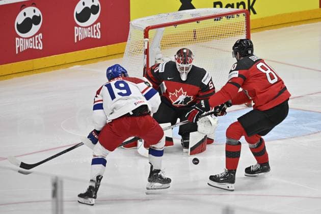 Czech Republic vs Canada group A, match of 2024 IIHF World Championship, WM, Weltmeisterschaft in Prague, Czech Republic, on May 21, 2024. From left Czech Jakub Flek, Jordan Binnington, goalie, Pierre-Luc Dubois, both of Canada. (CTKxPhoto VitxSimanek) CTKPhotoP2024052105973 CTKPhotoP2024052105973