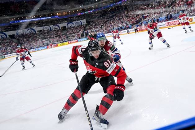 PRAGUE, CZECH REPUBLIC - MAY 21: John Tavares of Canada protects the puck along the boards from David Tomasek during the preliminary round match between Canada and Czechia at Prague Arena on May 21, 2024 in Prague, Czech Republic. Prague Prague Arena Czech Republic Copyright: xJustPictures.ch AndreaxBrancax jp-en-EuSpIm-AB_21052024_DSC_0264