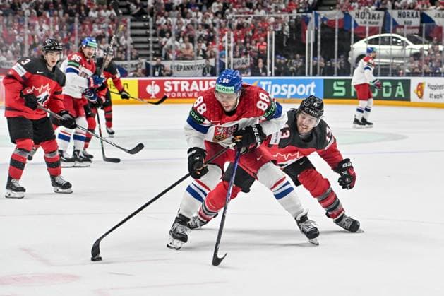 PRAGUE, CZECH REPUBLIC - MAY 21: David Pastrnak of Czechia protects the puck from Brandon Tanev of Canada during the preliminary round match between Canada and Czechia at Prague Arena on May 21, 2024 in Prague, Czech Republic. Prague Prague Arena Czech Republic Copyright: xJustPictures.ch AndreaxBrancax jp-en-EuSpIm-AB_21052024_AAB_3621