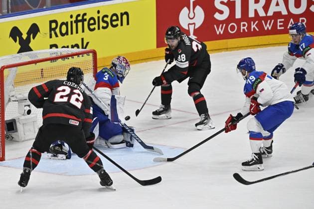 Canada vs Slovakia quarter-final match of the 2024 IIHF World Championship, WM, Weltmeisterschaft in Prague, Czech Republic, on May 23, 2024. L-R Dylan Cozens (CAN), goalkeeper Samuel Hlavaj (SVK), Brandon Hagel (CAN), Libor Hudacek (SVK), Simon Nemec (SVK). (CTKxPhoto VitxSimanek) CTKPhotoP2024052307157  CTKPhotoP2024052307157