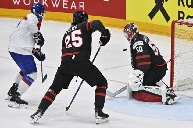 Canada vs Slovakia quarter-final match of the 2024 IIHF World Championship, WM, Weltmeisterschaft in Prague, Czech Republic, on May 23, 2024. L-R Pavol Regenda (SVK), Owen Power (CAN), goalkeeper Jordan Binnington (CAN). (CTKxPhoto VitxSimanek) CTKPhotoP2024052307171  CTKPhotoP2024052307171