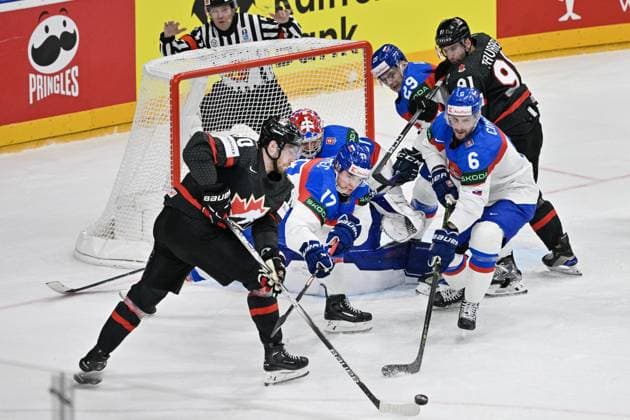 Canada vs Slovakia quarter-final match of the 2024 IIHF World Championship, WM, Weltmeisterschaft in Prague, Czech Republic, on May 23, 2024. L-R Pierre-Luc Dubois (CAN), goalkeeper Samuel Hlavaj (SVK), Simon Nemec (SVK), Michal Ivan (SVK), Lukas Cingel (SVK), John Tavares (CAN). (CTKxPhoto VitxSimanek) CTKPhotoP2024052307534 CTKPhotoP2024052307534