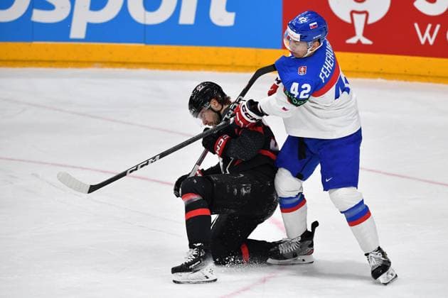 May 23, 2024, Prague, Czech Republic: BRANDON HAGEL of Canada (down) and MARTIN FEHERVARY (42) of Slovakia during the 2024 IIHF Ice hockey, Eishockey World Championship, WM, Weltmeisterschaft quarter-final match between Canada v Slovakia at the O2 arena in Prague, Czech Republic, May 23, 2024.