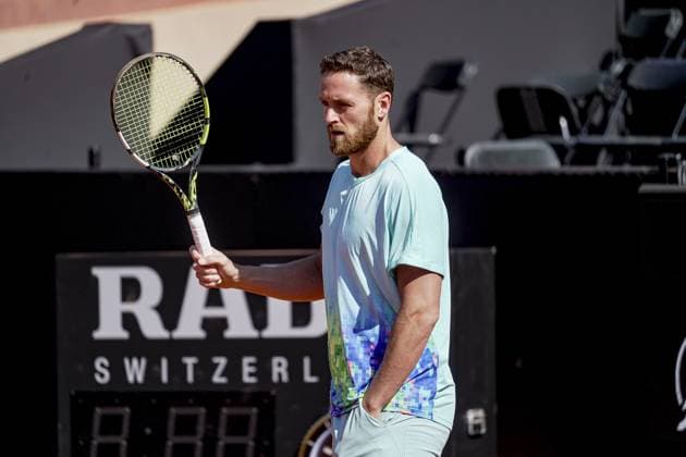 Le joueur de tennis francais Albano OLIVETTI Ã l Ã chauffement avant la finale du double lors du tournoi de l Open Parc Auvergne RhÃ ne-Alpes Ã Lyon le 25 05 2024. TENNIS : Open Parc - Lyon - 25 05 2024 SandrineThesillat Panoramic 