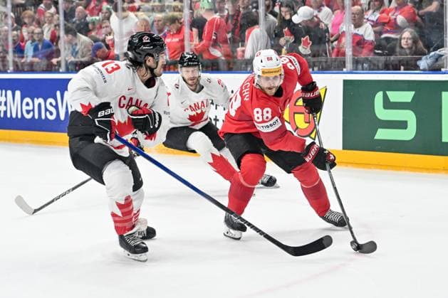 PRAGUE, CZECH REPUBLIC - MAY 25: Christoph Bertschy of Switzerland protects the puck from Brandon Tanev of Canada during the 2024 IIHF Ice hockey, Eishockey World Championship, WM, Weltmeisterschaft Czechia Semifinal match between Canada and Switzerland at Prague Arena on May 25, 2024 in Prague, Czech Republic. Prague Prague Arena Czech Republic Copyright: xJustPictures.ch AndreaxBrancax jp-en-EuSpIm-AB_25052024_AAB_4004