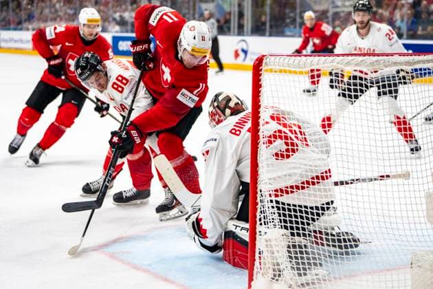 Sport Bilder des Tages PRAGUE, CZECH REPUBLIC - MAY 25: Sven Senteler of Switzerland (C) against Andrew Mangiapane of Canada (L) and goalkeeper Jordan Binnington of Canada (R) during the 2024 IIHF Ice hockey, Eishockey World Championship, WM, Weltmeisterschaft Czechia Semifinal match between Canada and Switzerland at Prague Arena on May 25, 2024 in Prague, Czech Republic. Prague Prague Arena Czech Republic Copyright: xJustPictures.ch JarixPestelaccix jp-en-EuSpIm-JP4_JAR_Canada_Switzerland_25May_2024075