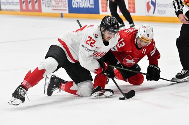 PRAGUE, CZECH REPUBLIC - MAY 25: Dylan Cozens of Canada and Nico Hischier of Switzerland in a battle for the puck during the 2024 IIHF Ice hockey, Eishockey World Championship, WM, Weltmeisterschaft Czechia Semifinal match between Canada and Switzerland at Prague Arena on May 25, 2024 in Prague, Czech Republic. Prague Prague Arena Czech Republic Copyright: xJustPictures.ch AndreaxBrancax jp-en-EuSpIm-AB_25052024_AAB_4447