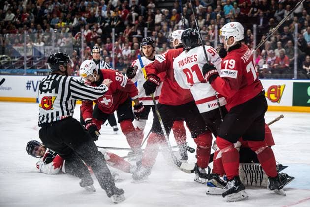 240525 Pierre-Luc Dubois and John Tavares against Jonas Siegenthaler and Calvin Thurkauf of Switzerland during the 2024 IIHF Ice hockey, Eishockey World Championship, WM, Weltmeisterschaft semifinal game between Canada and Switzerland on May 25, 2024 in Prague. Photo: Maxim ThorÃ BILDBYRAN kod MT MT0602 ishockey ice hockey ishockey-vm canada switzerland 2024 iihf ice hockey world championship bbeng schweiz kanada semifinal Copyright: MAXIMxTHORE BB240525MT214