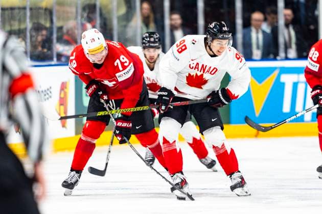 PRAGUE, CZECH REPUBLIC - MAY 25: Calvin Thurkauf of Switzerland (L) against Connor Bedard of Canada (R) during the 2024 IIHF Ice hockey, Eishockey World Championship, WM, Weltmeisterschaft Czechia Semifinal match between Canada and Switzerland at Prague Arena on May 25, 2024 in Prague, Czech Republic. Prague Prague Arena Czech Republic Copyright: xJustPictures.ch JarixPestelaccix jp-en-EuSpIm-JP4_JAR_Canada_Switzerland_25May_2024164