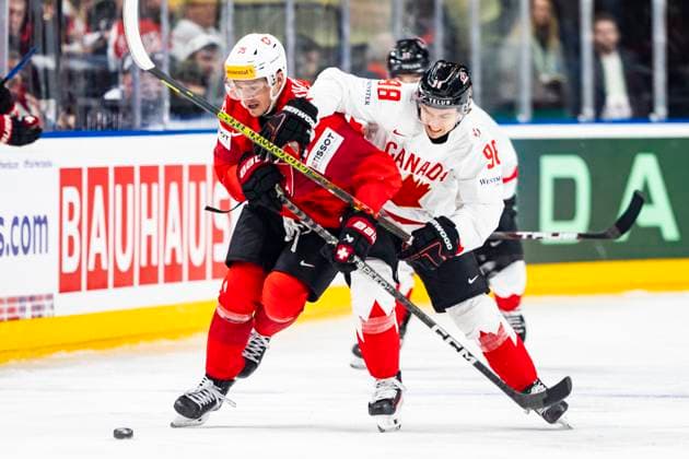 PRAGUE, CZECH REPUBLIC - MAY 25: Connor Bedard of Canada (R) against Calvin Thurkauf of Switzerland (L) during the 2024 IIHF Ice hockey, Eishockey World Championship, WM, Weltmeisterschaft Czechia Semifinal match between Canada and Switzerland at Prague Arena on May 25, 2024 in Prague, Czech Republic. Prague Prague Arena Czech Republic Copyright: xJustPictures.ch JarixPestelaccix jp-en-EuSpIm-JP4_JAR_Canada_Switzerland_25May_2024167