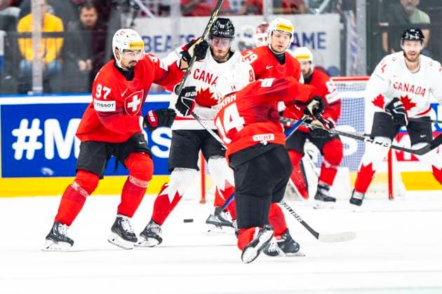 PRAGUE, CZECH REPUBLIC - MAY 25: Dean Kukan of Switzerland (C) take a shot during the 2024 IIHF Ice hockey, Eishockey World Championship, WM, Weltmeisterschaft Czechia Semifinal match between Canada and Switzerland at Prague Arena on May 25, 2024 in Prague, Czech Republic. Prague Prague Arena Czech Republic Copyright: xJustPictures.ch JarixPestelaccix jp-en-EuSpIm-JP4_JAR_Canada_Switzerland_25May_2024185