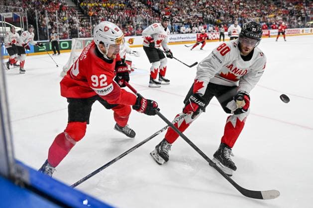 PRAGUE, CZECH REPUBLIC - MAY 25: Gaetan Haas of Switzerland and Pierre-Luc Dubois of Canada battle for the puck during the 2024 IIHF Ice hockey, Eishockey World Championship, WM, Weltmeisterschaft Czechia Semifinal match between Canada and Switzerland at Prague Arena on May 25, 2024 in Prague, Czech Republic. Prague Prague Arena Czech Republic Copyright: xJustPictures.ch AndreaxBrancax jp-en-EuSpIm-AB_25052024_DSC_7137