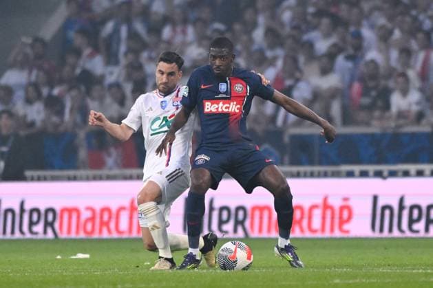 Ousmane DEMBELE ( 10 - PSG ) and Nicolas TAGLIAFICO ( 3 - Lyon ) during the Final French Cup match between Olympique Lyonnais and Paris Saint Germain at Decathlon Arena Stade Pierre Mauroy on May 25, 2024 in Lille, France. ( Photo by federico pestellini panoramic ) - FOOTBALL : Lyon vs PSG - Finale Coupe de France - 25 05 2024 FedericoPestellini Panoramic 