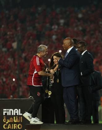 CAIRO, EGYPT - MAY 25: head coach Marcel Koller celebrate on stage with a gold medal after wining the CAF Champions League Final Second Leg match between Al Ahly and Esperance Sportive Tunis at Cairo International Stadium on May 25, 2024 in Cairo, Al Ahly v Esperance Sportive Tunis: Final Second Leg - CAF Champions League Copyright: xPhotoxbyxM.Bayoumy SFSIx