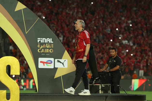 CAIRO, EGYPT - MAY 25: head coach Marcel Koller celebrate on stage with a gold medal after wining the CAF Champions League Final Second Leg match between Al Ahly and Esperance Sportive Tunis at Cairo International Stadium on May 25, 2024 in Cairo, Al Ahly v Esperance Sportive Tunis: Final Second Leg - CAF Champions League Copyright: xPhotoxbyxM.Bayoumy SFSIx
