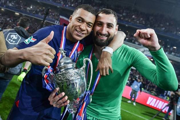 Paris Saint-Germain celebrates the 2023-2024 French Cup championship trophy ceremony in Lille FA Paris Saint-Germain?s forward Kylian Mbappe celebrates with Paris Saint-Germain?s goalkeeper Gianluigi Donnarumma during the 2023-2024 French Cup championship trophy ceremony following the final football match between Olympique Lyonnais and Paris Saint-Germain at the Decathlon Arena - Pierre Mauroy stadium in Lille on May 25, 2024. Photo by Firas Abdullah ABACAPRESS.COM  Copyright: xAbdullahxFiras ABACAx