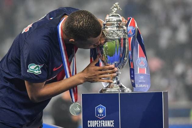 Paris Saint-Germain celebrates the 2023-2024 French Cup championship trophy ceremony in Lille FA Paris Saint-Germain?s forward Kylian Mbappe kisses the cup as he celebrates during the 2023-2024 French Cup championship trophy ceremony following the final football match between Olympique Lyonnais and Paris Saint-Germain at the Decathlon Arena - Pierre Mauroy stadium in Lille on May 25, 2024. Photo by Firas Abdullah ABACAPRESS.COM  Copyright: xAbdullahxFiras ABACAx