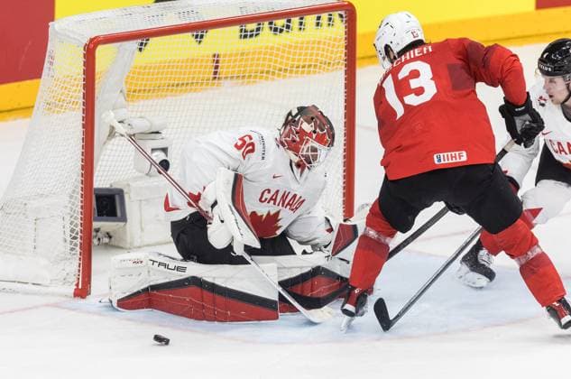 Canada v Switzerland - IIHF Ice hockey, Eishockey World Championship, WM, Weltmeisterschaft Semi-final Jordan Binnington and Nico Hischier are playing during the IIHF Ice Hockey World Championship semi-final, Canada vs. Switzerland match in Prague, Czech Republic, on May 25, 2024. Prague Czech Republic  Copyright: xFotoxOlimpikx originalFilename:jastrzebowski-canadavs240525_npQB8.jpg