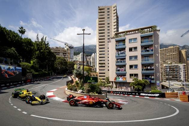 MONACO - Oscar Piastri (McLaren) and Charles Leclerc (Ferrari) during the Monaco Grand Prix. ANP SEM VAN DER WAL xVIxANPxSportx xxANPxIVx 499642184 originalFilename: 499642184.jpg